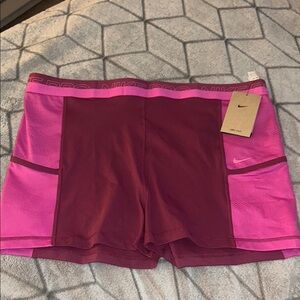 Nike Pink and Red Athletic Shorts with Performance Fabric